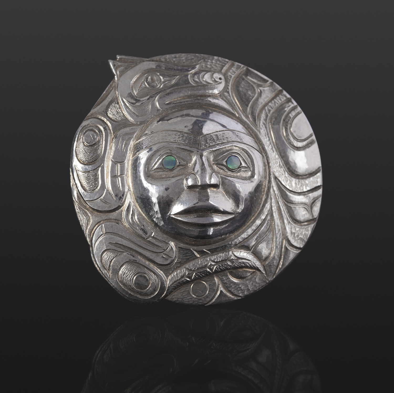 Wolf and Moon pendant Gus Cook Kwakwaka'wakw silver Repoussé jewelry pendant abalone native art northwest coast 1 3/4 x 1 3/4 1850