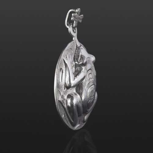 the catch pendant dragonfly frog Gus Cook Kwakwaka'wakw silver Repoussé jewelry pendant native art northwest coast 2 x 1 1/2 1400