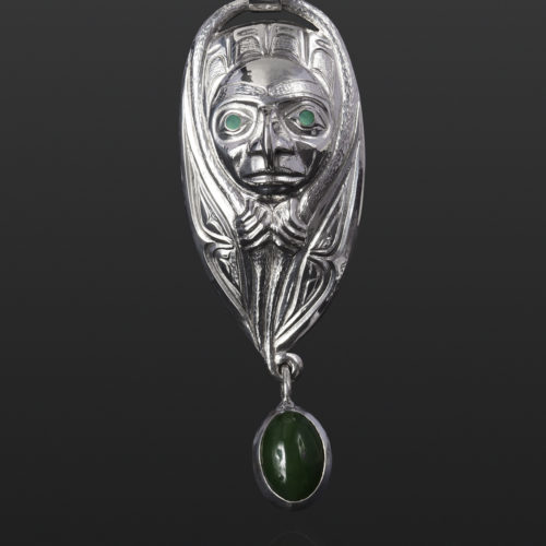 emergence pendant hawk transformation jade Gus Cook Kwakwaka'wakw abalone silver Repoussé jewelry pendant native art northwest coast