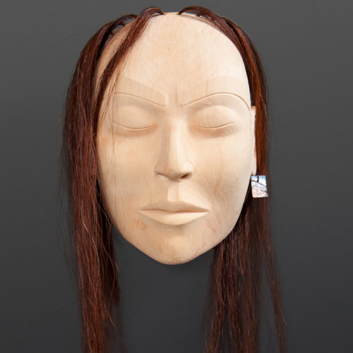 Woman Portrait Mask Raymond SHaw Kwakwaka'wakw Yellow cedar, horse hair, abalone 11" x10" x 5" 31" with hair $3000
