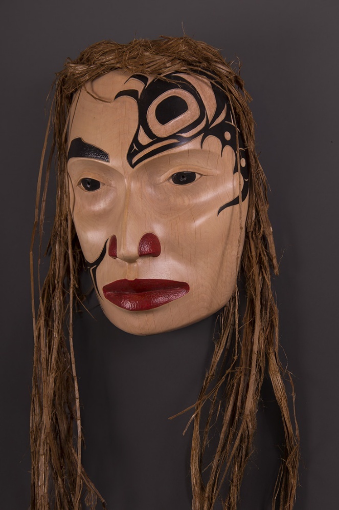 Maiden of Temlahamid Portrait Mask Arlene Ness - Gitxsan Alder, paint, cedar bark 9" x 6 3/4" x 3 1/2"