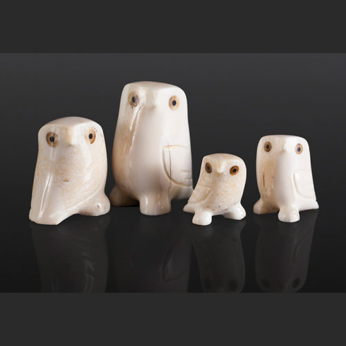 happy family Ivory, bone, baleen Largest: 2 1/2" x 1 1/2" x 1" Smallest: 1 1/4" x 1 1/4" x 1" Set of four $625