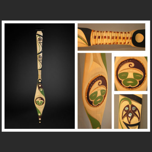 chocolate lily root digging paddle Angela Marston Coast Salish Yellow Cedar, Red Cedar, Cedar Root, Wild Cherry Bark, Abalone, Acrylic Paint 37 x 4-1/4" sold Root paddles were smaller than canoe paddles and specially made for digging roots by the Coast Salish people. They were also used for pulling the canoe, or branches toward ones self. The Chocolate Lily has roots that resemble grains of rice. It was harvested and boiled in cedar boxes and eaten like rice.