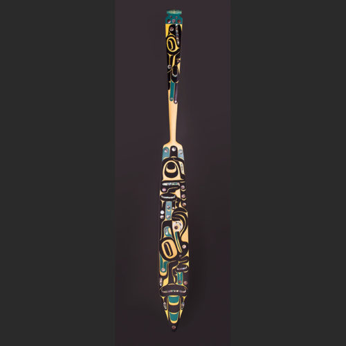 Raven Brings the Salmon Paddle Steersman’s paddle Moy Sutherland Nuu Chah Nulth Yellow cedar, paint, abalone 85” x 8” x 1 ½”