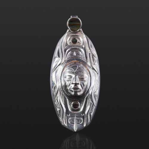 New Moon  Gus Cook  Kwakwaka’wakw  Silver and abalone  woman pendant repousse jewelry 1½ x ½ 1600